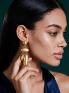 Detailed front view of textured gold waterdrop statement earrings designed for lightweight everyday luxury.