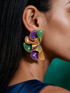 Close-up side profile showing lightweight purple, green, and gold sculptural ruffle earrings with bold geometric design and luxurious gold detailing.